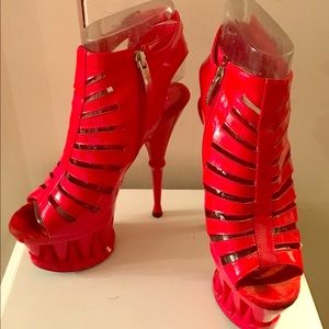 Pair of red sexy high heel shoes